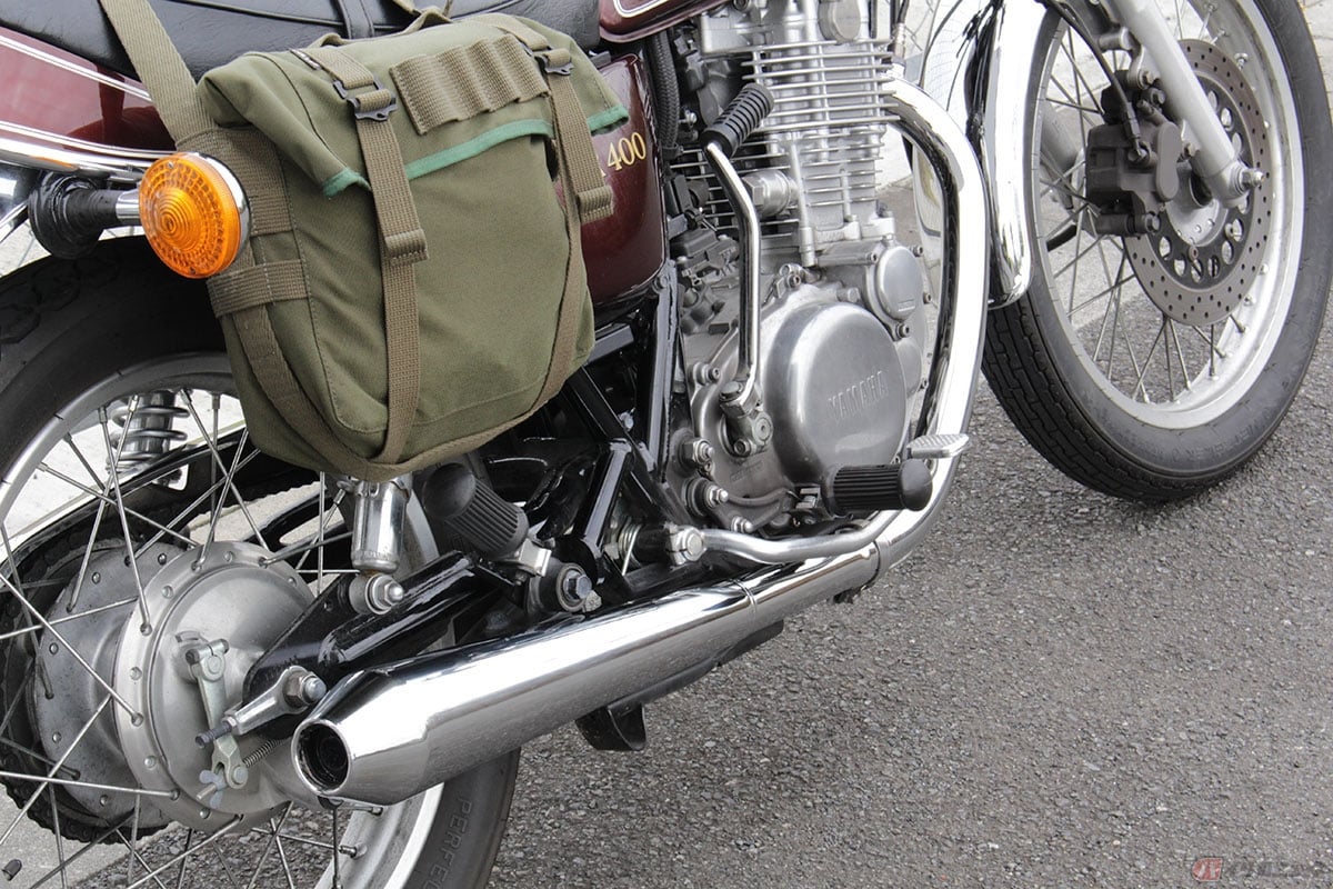 筆者(佐賀山敏行)が所有していたSR400に装着していたデイトナ製サイレンサー(廃盤)